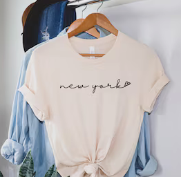  Tee Shirt saying new York in cursive font